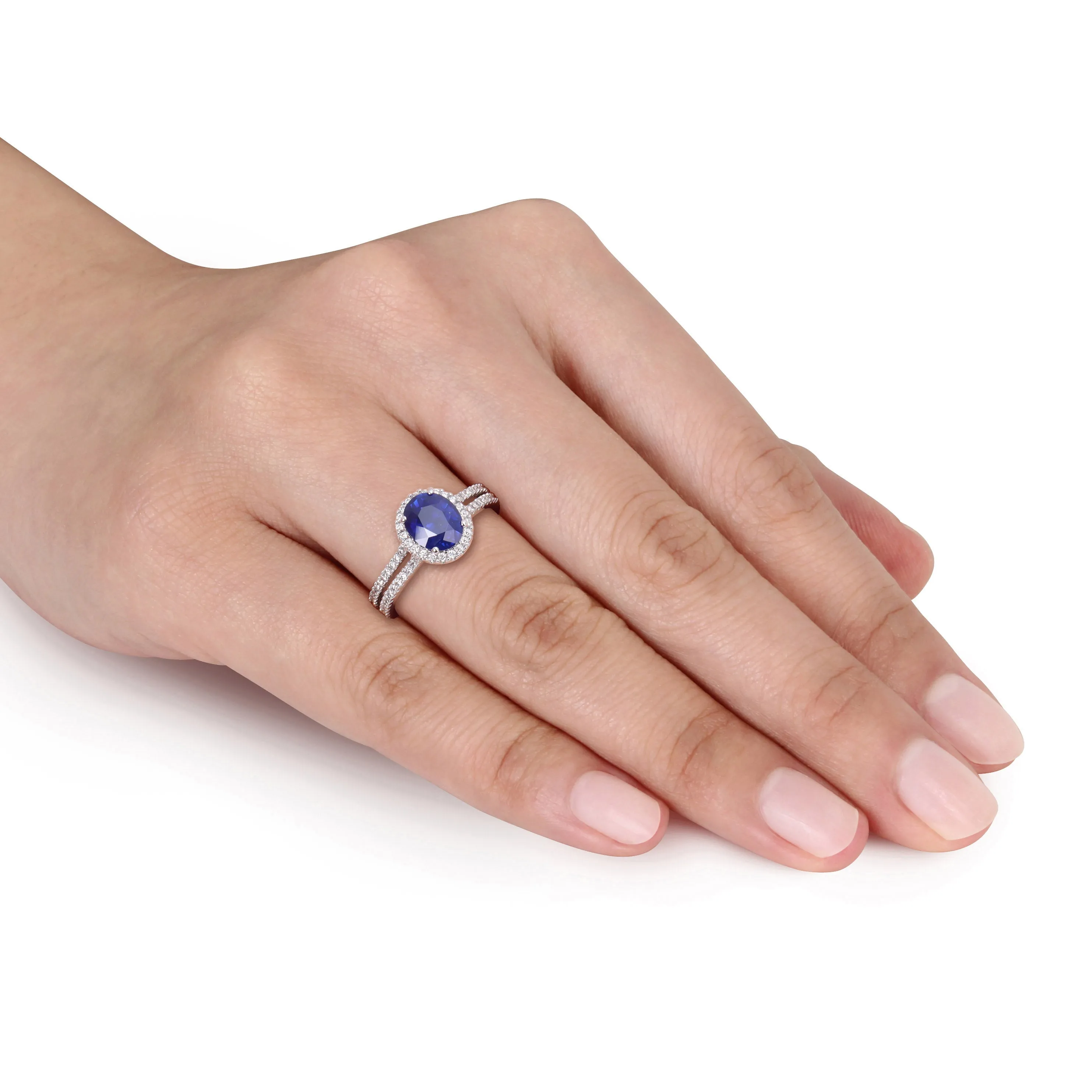 1 4/5 CT TGW Oval Blue Sapphire and 3/8 CT TW Diamond Halo Engagement Ring in 14K White Gold